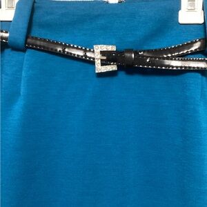 George # 1Vibrant Blue color skirt and #2 a deep red color skirt size 10.